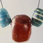 Val Cenis Maak je prehistorische ketting in het archeologisch museum van - JF.Laurenceau